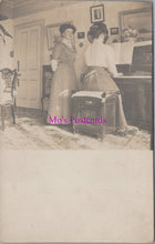 Load image into Gallery viewer, Ancestors Postcard - Lady Playing The Piano SX444