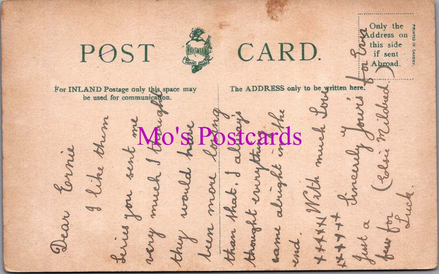 Vintage postcard with handwritten text and a stamp, featuring the brand 'Mo's Postcards'.