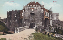 Load image into Gallery viewer, Colorized postcard of a castle with a woman walking towards it, labeled 'Dover Castle'.