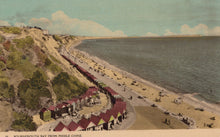 Load image into Gallery viewer, Vintage-style illustration of a coastal scene with a beach and buildings.