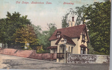 Load image into Gallery viewer, Vintage postcard of a house with trees and a road in the background
