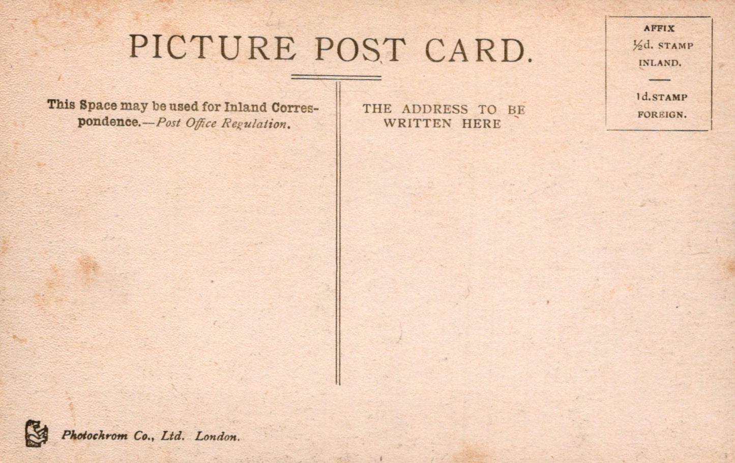 Vintage picture postcard with text and stamps on a beige background