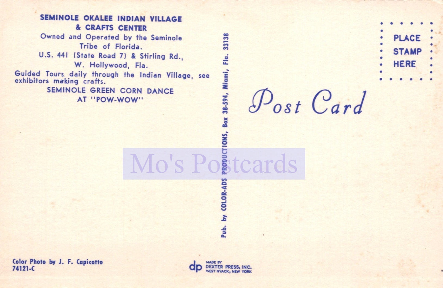 Back of a postcard from Seminole Okalee Indian Village & Crafts Center with text and branding.