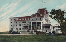 Load image into Gallery viewer, Historic hotel building with vintage cars and people in front, likely from the early 20th century.