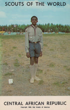 Load image into Gallery viewer, Scout in uniform standing outdoors with 'Scouts of the World' and 'Central African Republic' text.