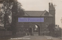 Load image into Gallery viewer, Vintage photograph of a large building with an archway, labeled 'Mo's Postcards'.