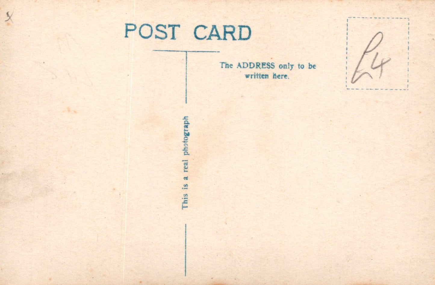 Vintage postcard with text and a signature on a beige background