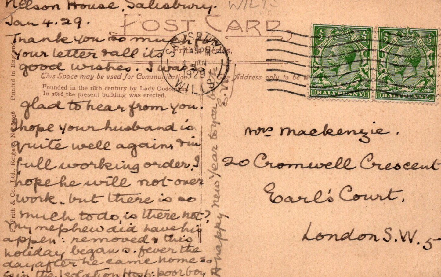 Vintage postcard with handwritten text and postage stamps on a beige background