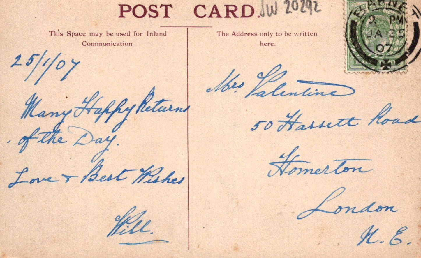Vintage postcard with handwritten text and a stamp, featuring airmail label.