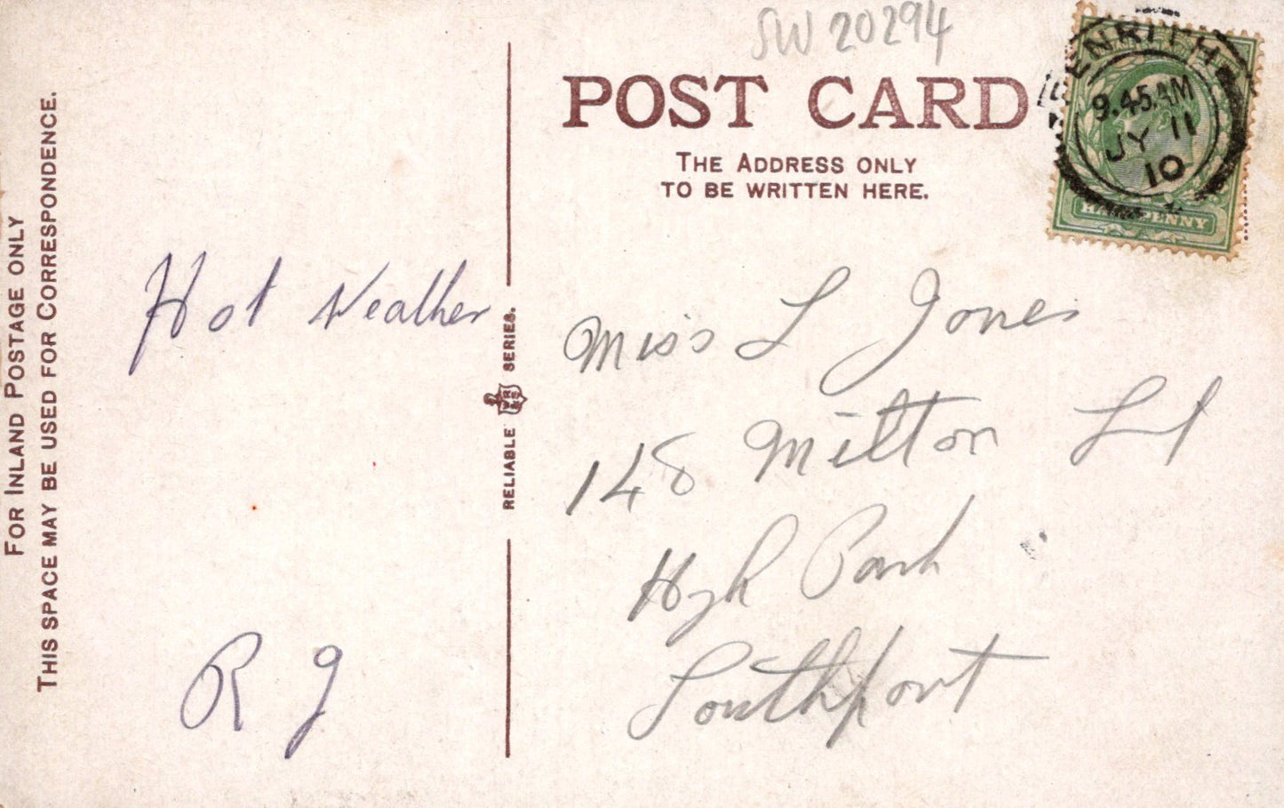 Vintage postcard with handwritten address and a stamp on a light brown background
