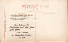 Load image into Gallery viewer, Greetings Postcard - A Christmas Greeting, Lady Wearing a Fancy Hat SX140