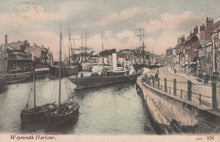 Load image into Gallery viewer, Vintage postcard of Weymouth Harbour with ships and buildings.