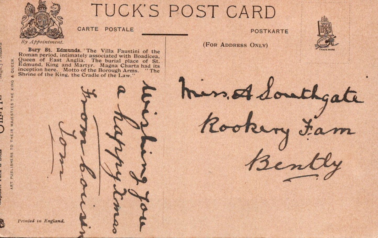 Vintage postcard with text and stamps on a brown background