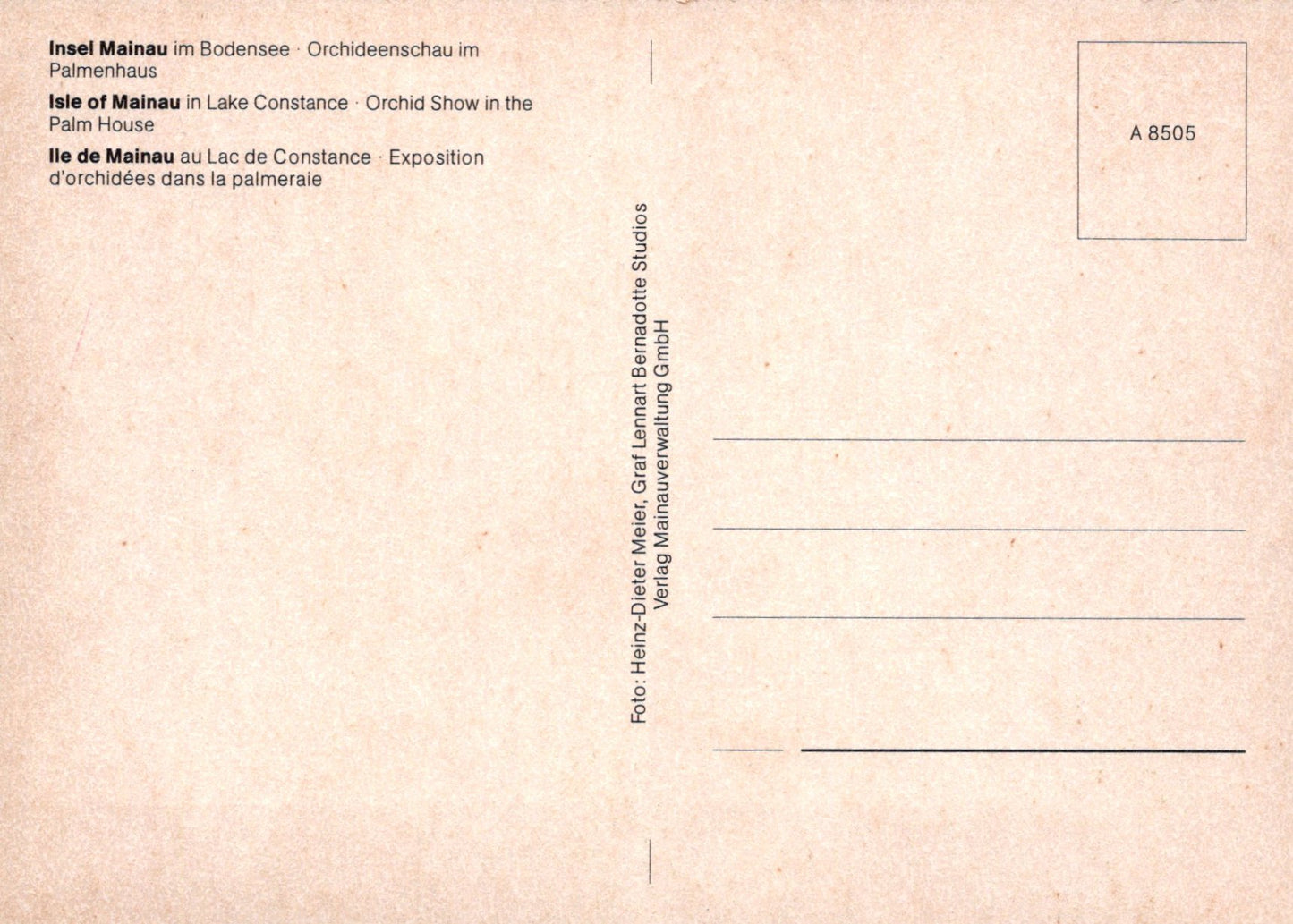 Back of a postcard with text in multiple languages on a beige background