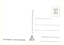 Load image into Gallery viewer, Back of a postcard with text and a logo on a white background