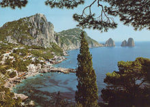 Load image into Gallery viewer, Scenic view of a coastal town with mountains and clear blue water