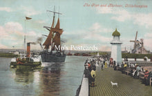 Load image into Gallery viewer, Vintage postcard of a pier and harbour scene with steamships and people.