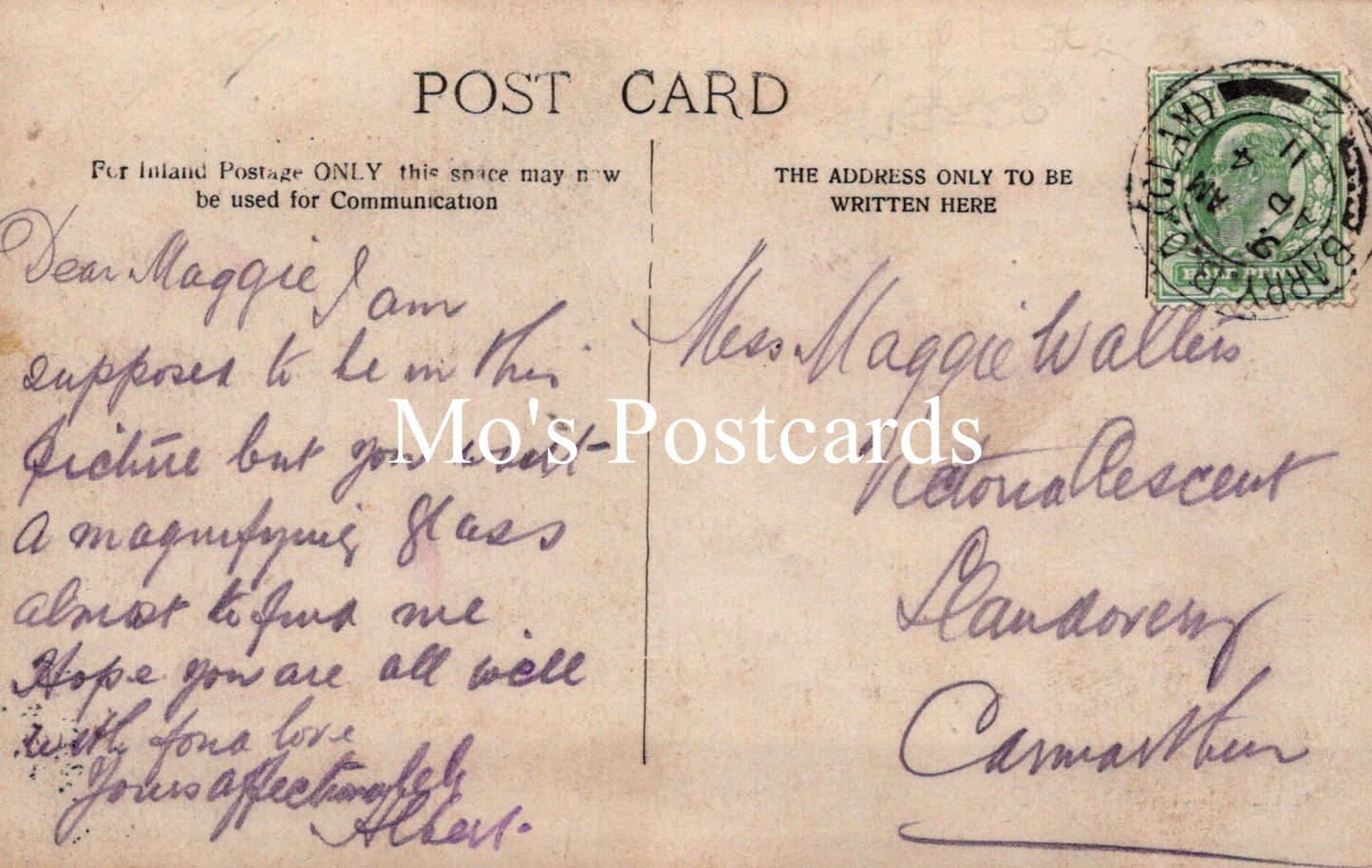 Vintage postcard with handwritten text and a stamp