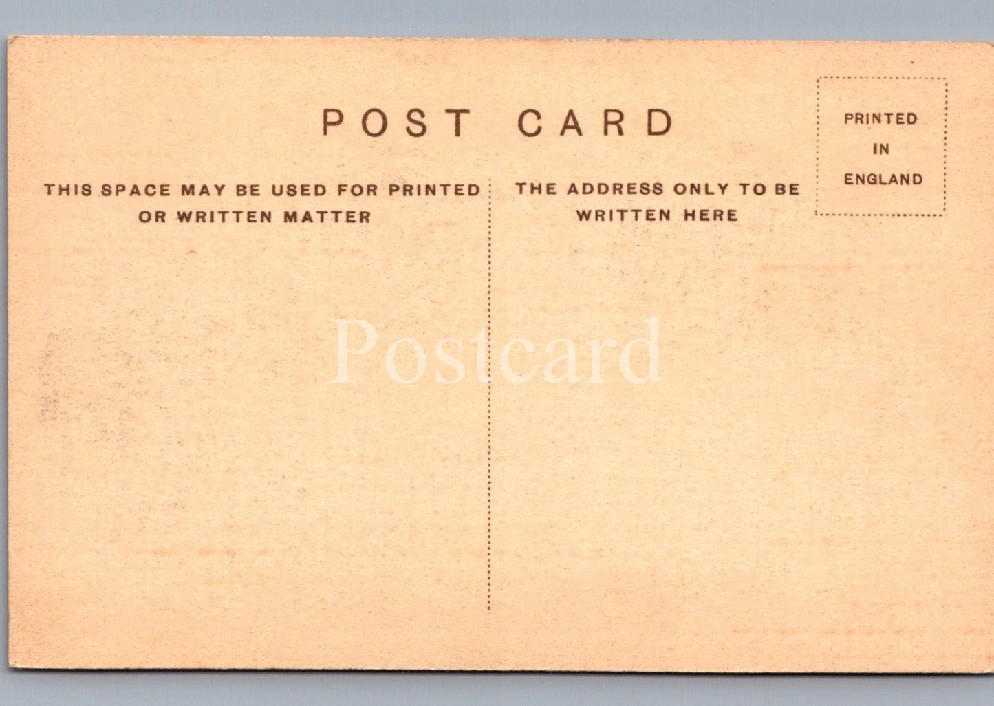 Back of a postcard with printed text on a beige background