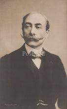 Load image into Gallery viewer, Vintage photograph of a man with a mustache wearing formal attire.