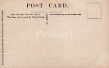 Load image into Gallery viewer, Back of a vintage postcard with text and a stamp