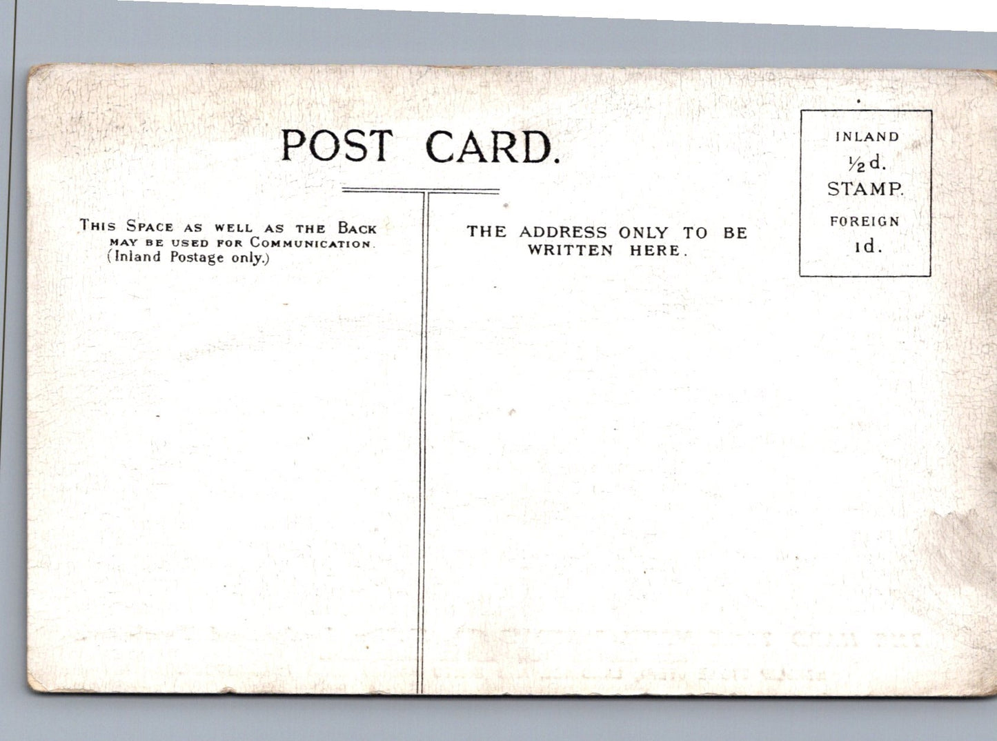 Back of a vintage postcard with text and postage information.
