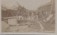 Load image into Gallery viewer, Vintage black and white photograph of a shipwreck with people around it, labeled 'Postcard'.