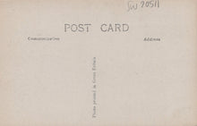 Load image into Gallery viewer, Back of a vintage postcard with text and a stamp