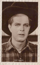 Load image into Gallery viewer, Vintage black and white photo of a man wearing a hat and plaid shirt with 'Hoot Gibson' text.