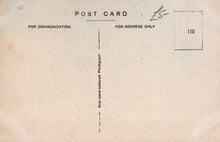 Load image into Gallery viewer, Back of a vintage postcard with text and a stamp