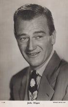 Load image into Gallery viewer, Black and white portrait of a smiling man in a suit with a Republic British Lion logo.