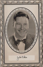 Load image into Gallery viewer, Vintage black and white portrait of a man with a bow tie in an ornate frame.
