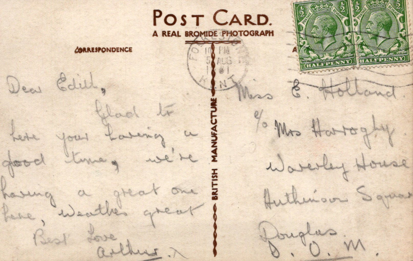 Vintage postcard with handwritten text and postage stamps