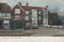 Load image into Gallery viewer, Vintage postcard of Brambletye Hotel in Forest Row with a red roof and white walls.