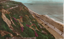 Load image into Gallery viewer, Vintage postcard of a coastal scene with a zigzag path, beach, and cliffs.