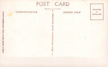Load image into Gallery viewer, Back of a postcard with typographic text on a beige background