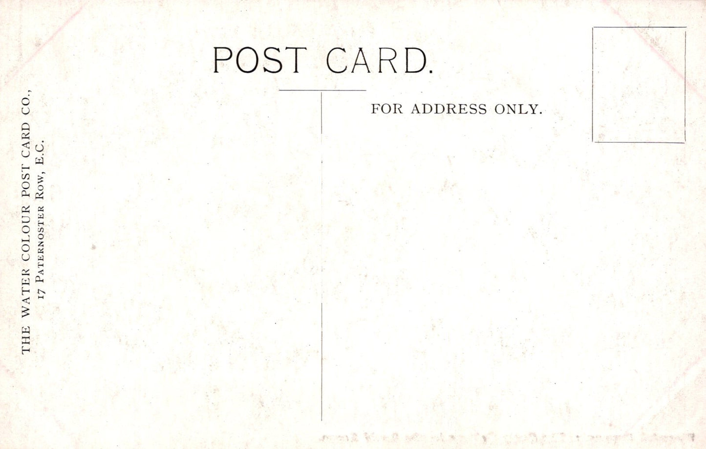 Back of a vintage postcard with text and a white border