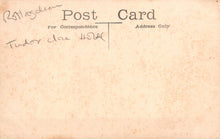 Load image into Gallery viewer, Vintage postcard with text and signature on a textured beige background