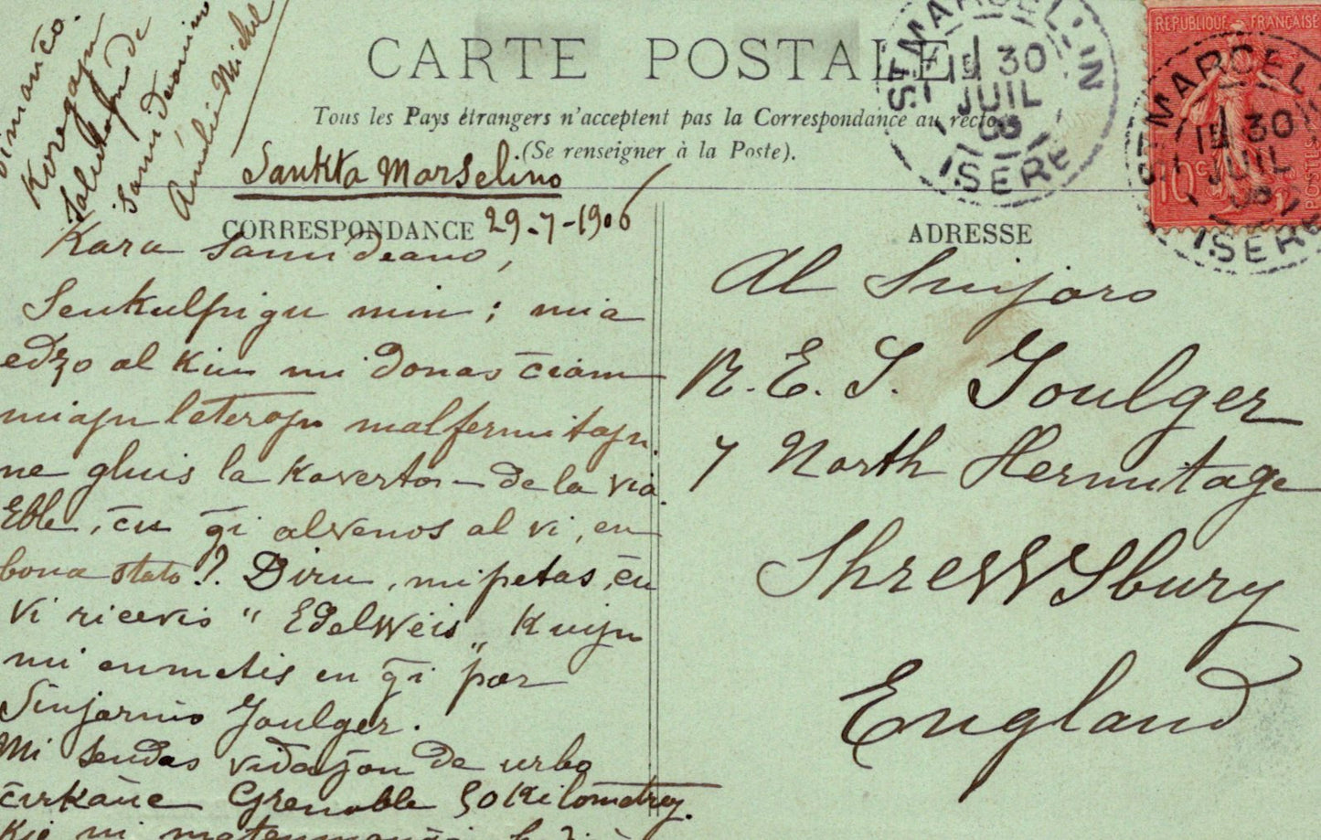 Vintage postcard with handwritten text and postage stamp, featuring a green background.