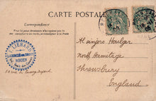 Load image into Gallery viewer, Vintage postcard with stamps and a sender's address on a brown background
