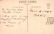 Load image into Gallery viewer, Vintage postcard with handwritten text and a vertical line.