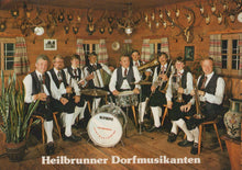 Load image into Gallery viewer, Band playing musical instruments in a room with hunting trophies