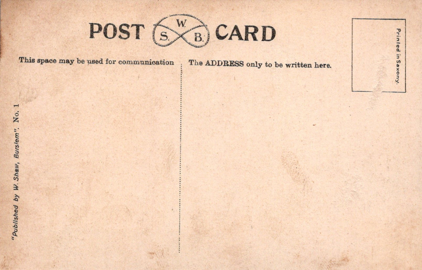 Back of a vintage postcard with typographic design and text.