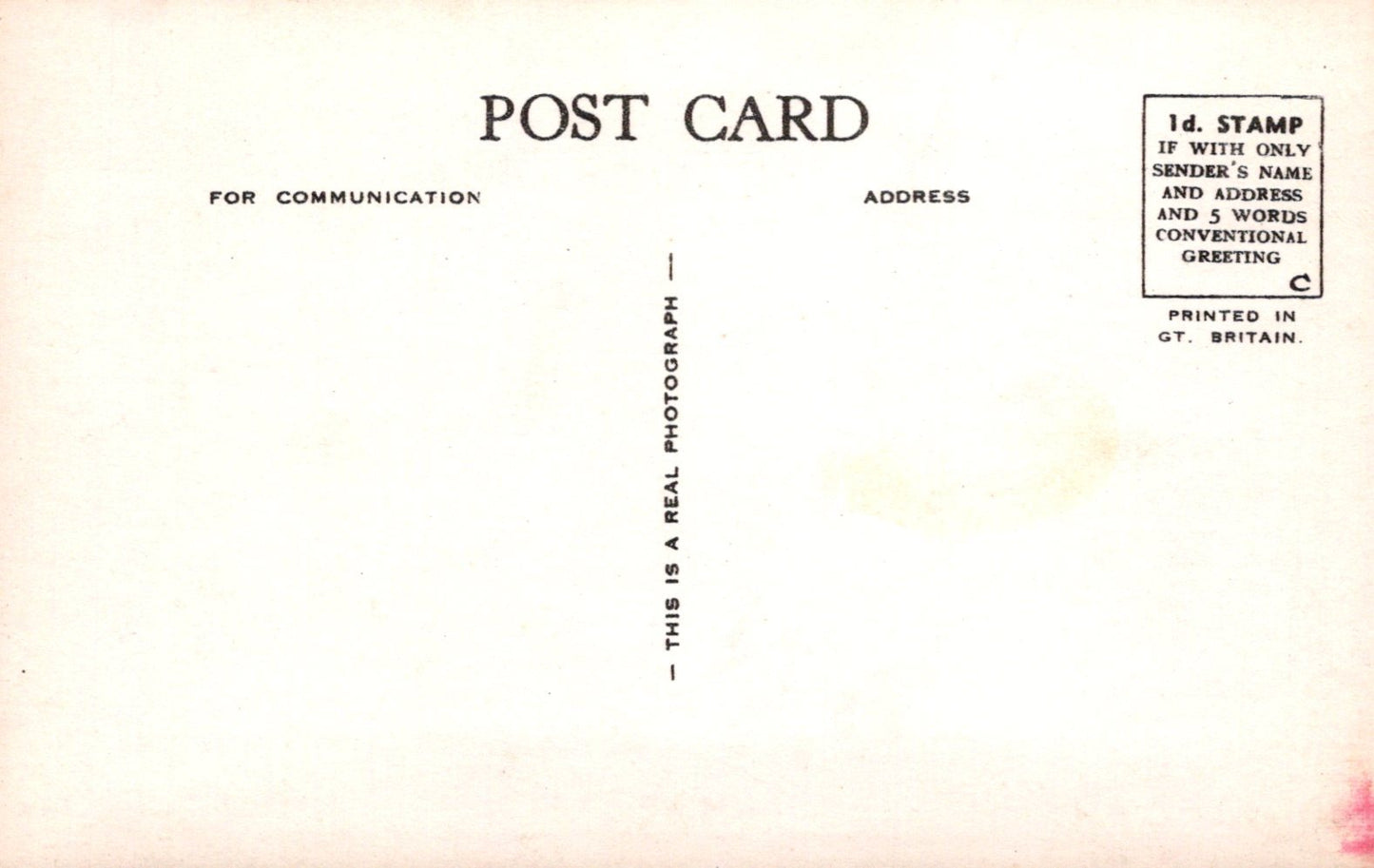 Vintage postcard with text and a stamp area on a light background
