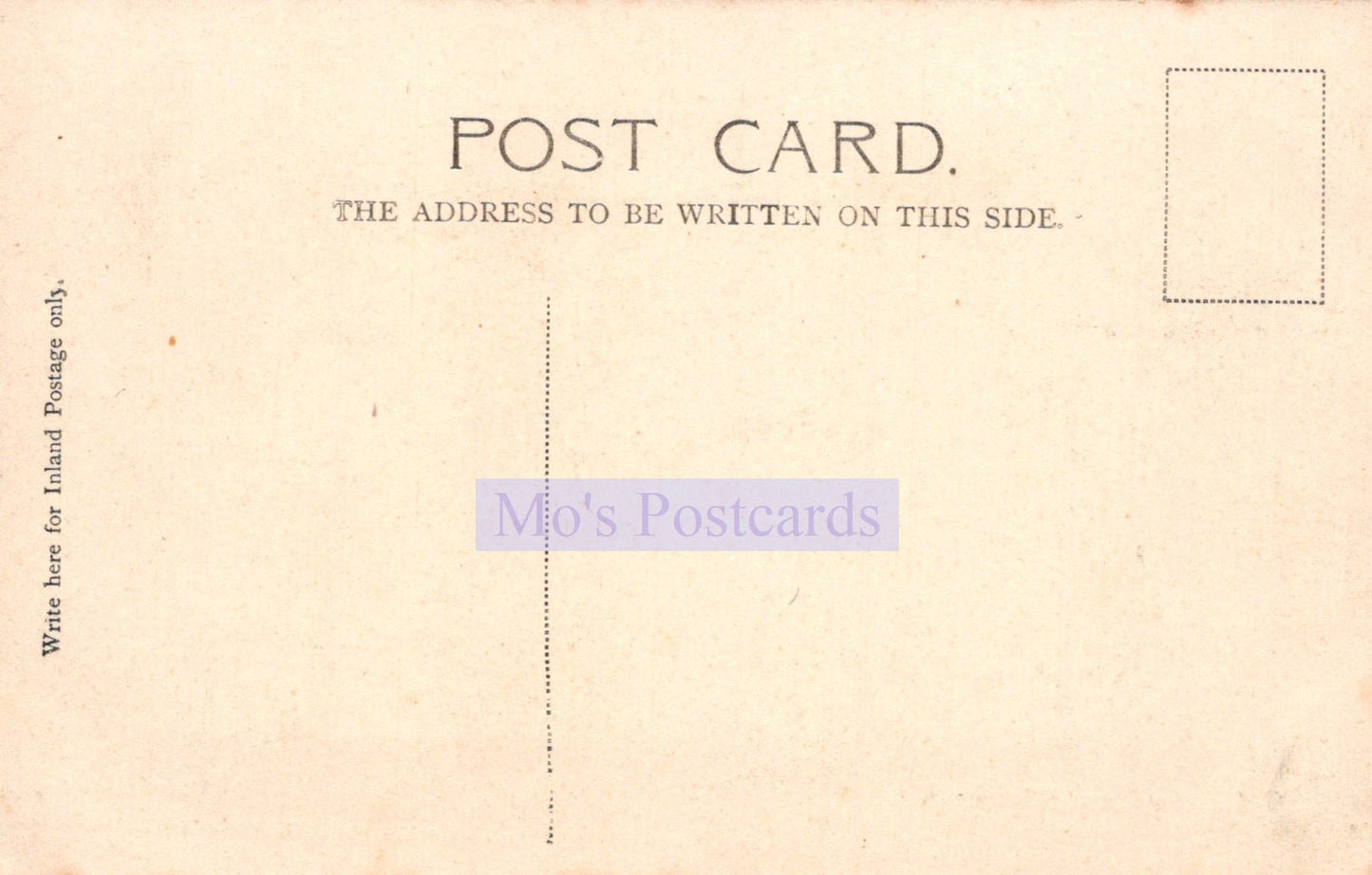 Back of a vintage postcard with text and a stamp area.