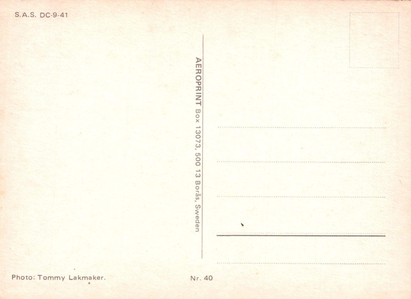 Vintage postcard with text and a photo credit on a light pink background