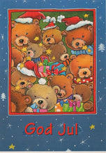 Load image into Gallery viewer, Christmas card with teddy bears wearing Santa hats and presents, set against a blue background with stars and trees.