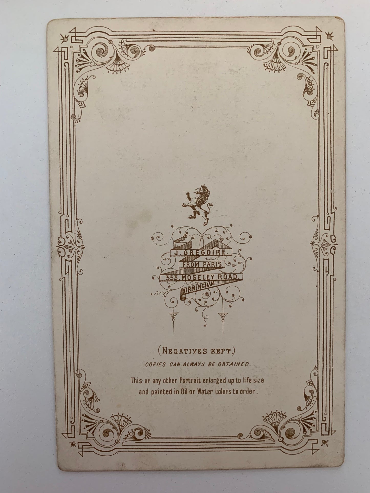 Vintage-style card with decorative border and text on a white background