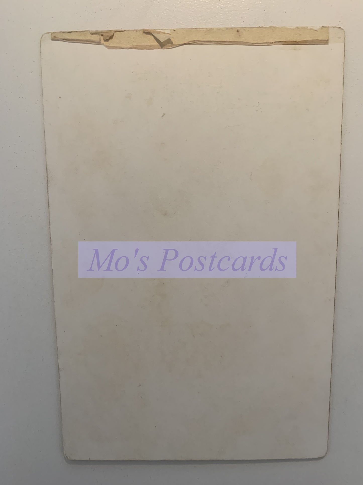 Vintage postcard with 'Mo's Postcards' label on a plain background
