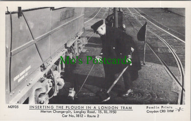 London Postcard - Inserting The Plough in a London Tram SW11746